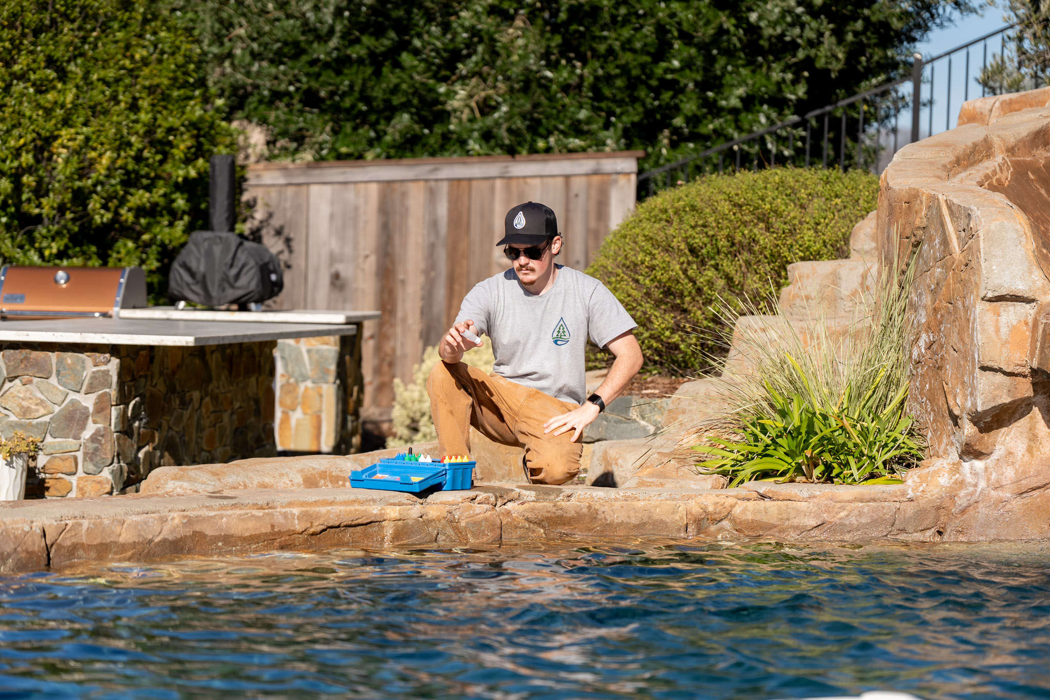 Pool Ninja tech inspecting pool equipment